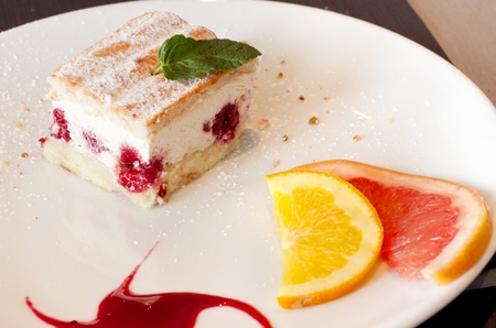 Cake with fruit on a plate in French の写真素材