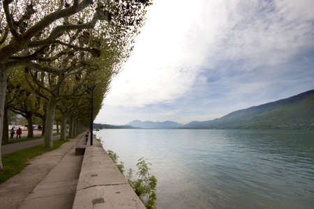 View of Lake Bourget and walk way of Aix-les-bains, in french alps, France, 08 May, 2013  のeditorial素材