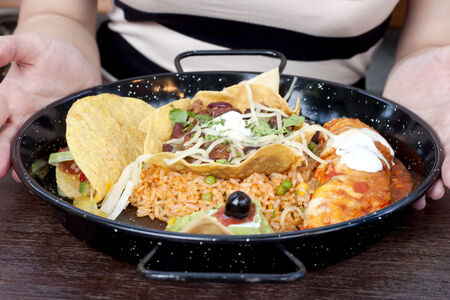 Variants of using traditional tortillas in meals (Mexican food).の写真素材