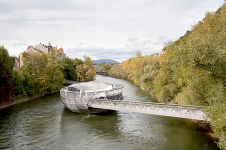 GRAZ, AUSTRIA - OCT 6: the Murinsel was designed from Vito Acconci (American architect) and built for the European Cultural Capital 2003 activities in the centre of Graz city on Oct 6, 2017 in Graz, Austria.のeditorial素材