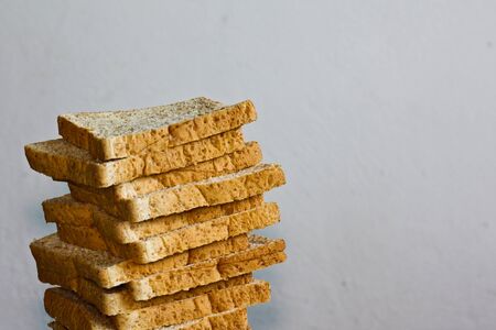 Many piece of bread is stacking up in disorderingの写真素材