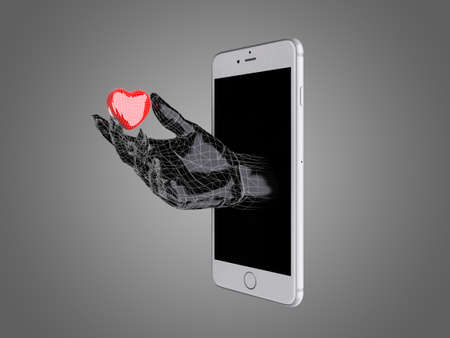 Hand hold the red heart out of a smart phone.の写真素材
