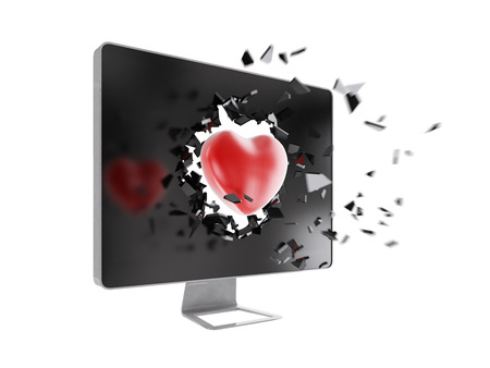 red heart destroy computer screen.の写真素材