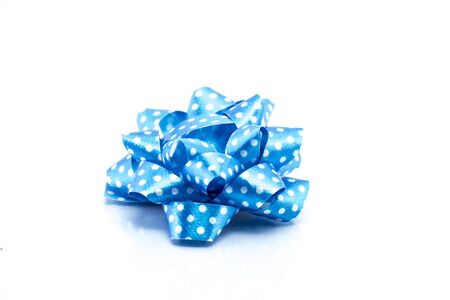 blue satin gift bow. Ribbon. Isolated on white, christmas objectの写真素材