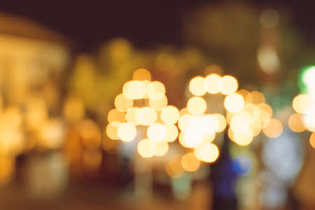 blurred city lights in the night, bokeh background, abstract backgroundの写真素材