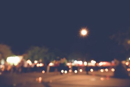 blurred city lights in the night, bokeh background, abstract backgroundの写真素材