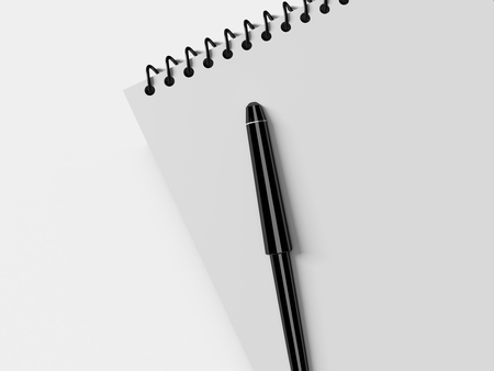 Blank note paper with pen. isolated on white, business object.の写真素材