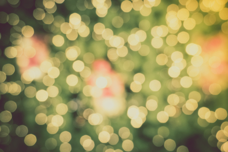Gold Christmas background of de-focused lights with decorated tree, Christmas backgroundの写真素材