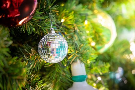 Gold Christmas background of de-focused lights with decorated tree, Christmas backgroundの写真素材