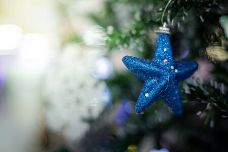 Close-up of a Christmas tree decorated. Holiday Christmas and new year wallpaper.の写真素材