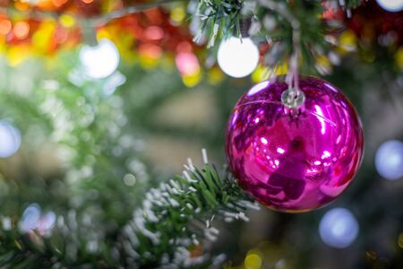 Close-up of a Christmas tree decorated. Holiday Christmas and new year wallpaper.の写真素材
