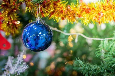 Close-up of a Christmas tree decorated. Holiday Christmas and new year wallpaper.の写真素材