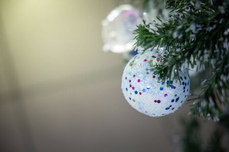 Close-up of a Christmas tree decorated. Holiday Christmas and new year wallpaper.の写真素材