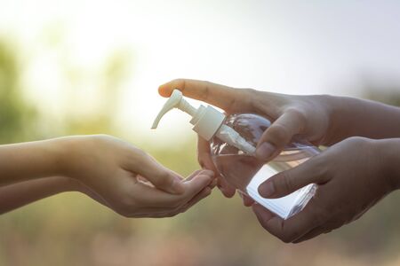 Washing hands by alcohol sanitizers. Prevention of flu disease. coronavirus (COVID-19) outbreak...