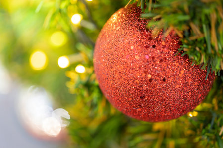 Close-up of a Christmas tree decorated. Holiday Christmas and new year wallpaper.の写真素材