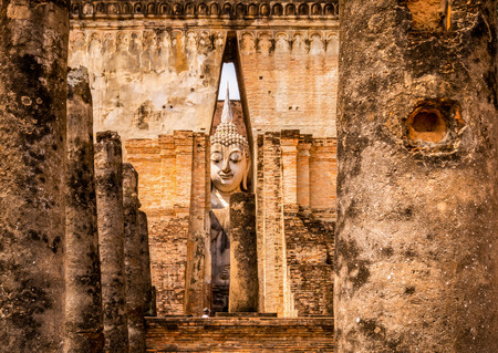 Sukhothai historical park and surrounding area in the midday and twilightの写真素材