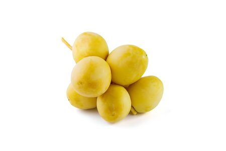 Yellow date palms isolated on white backgroundの写真素材