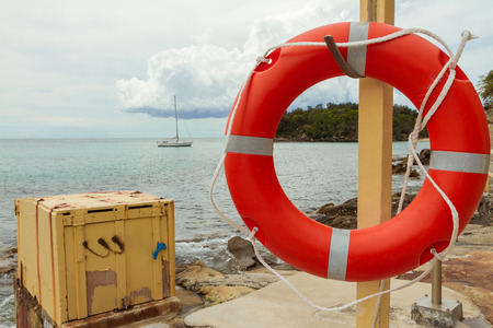 Life buoy hang ready for lifesave near the coastの写真素材