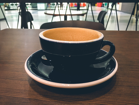 Empty coffee glass while waiting in the cafe, kill time while waiting for someoneの写真素材