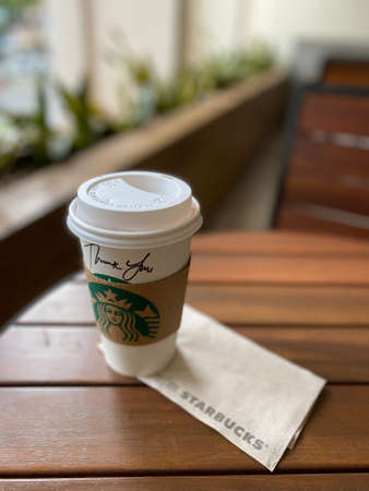 Penang, Malaysia - October 29, 2020 : View of a white Starbucks coffee cup with the words "Thank you" written by the barista at Pulau Tikusのeditorial素材