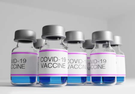 Close up of  vaccine bottles with white backgroundの写真素材
