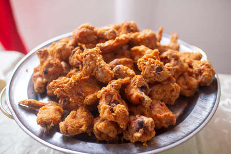 A plate full of home made fried chicken ready to be eatenの写真素材