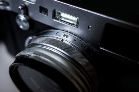 Close up of the aperture ring of a camera at f2.8 and f4の写真素材