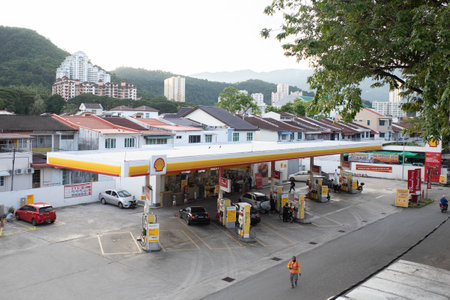 Penang, Malaysia  - October 18, 2022 : Aerial view of a Shell gas pump station with an attached convenience store at Penang, Malaysiaのeditorial素材