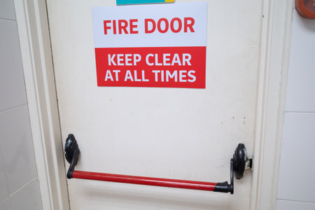 View of a building fire rated door with the sign to KEEP CLEAR AT ALL TIMES