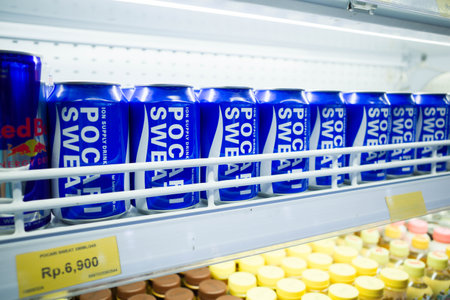 Bali, Indonesia - November 15, 2022 : Pocar Sweat energy isotonic drinks displayed and sold inside a convenience store at Nusa Dua Baliのeditorial素材