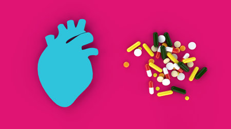 Assorted medical pills and human heart with red background in conceptual format. Showing the heart...