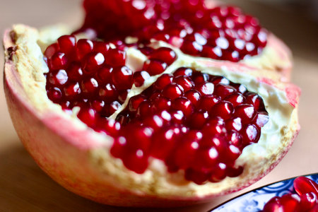 half of a pomegranate closeupの写真素材