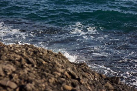 Waves of the Mediterranean Sea on the coastの写真素材