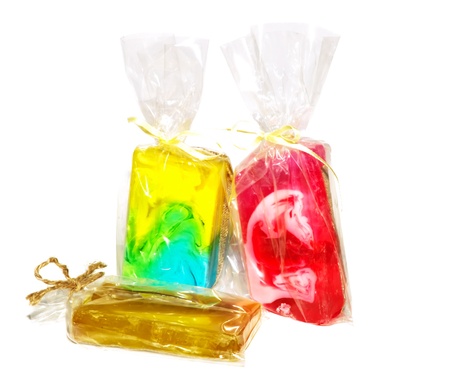 three pieces of packed handmade soap, isolated over white, nobody