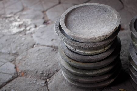 a traditional stone pestle mortar stackの写真素材