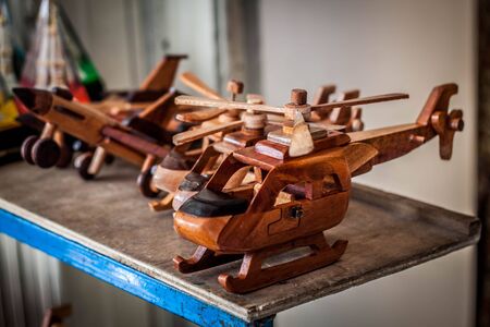 a wooden helicopter toys line in store market in malioboro jogja yogyakarta indonesia javaの写真素材