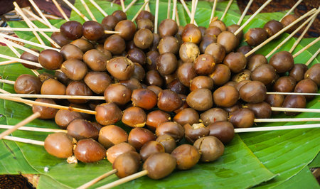 egg sate satay traditional food from central java served in banana green leaf foodの写真素材