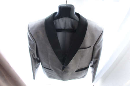 details of groom's suit