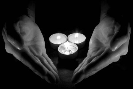 hand with candle の写真素材