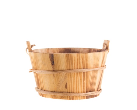 Wooden bucket isolated over white backgroundの写真素材