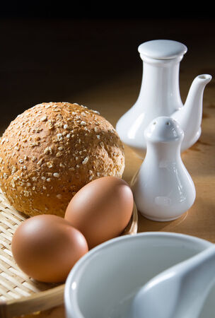 Breakfast set eggs and oat bread の写真素材