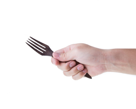Man hand with fork isolated on white の写真素材