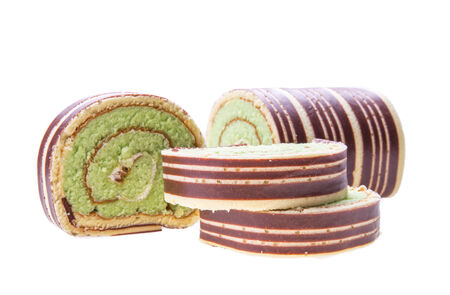 Swiss roll cake isolated on white backgroundの写真素材