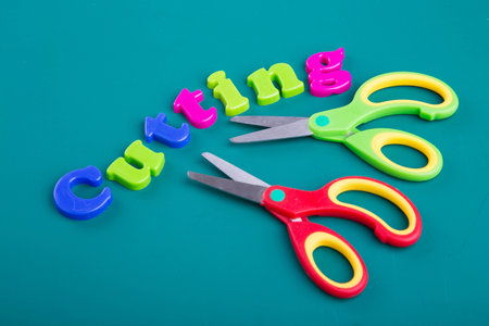 Colorful Alphabet magnetic letters on green backgroundの写真素材