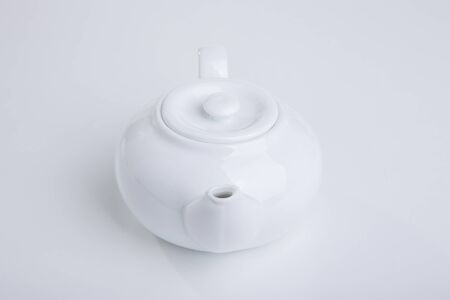 white teapot on white backgroundの写真素材