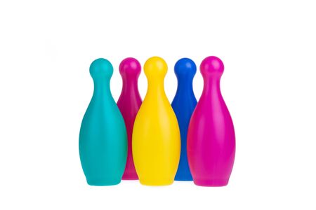 Colorful plastic skittles of toy bowling isolated on a white backgroundの写真素材