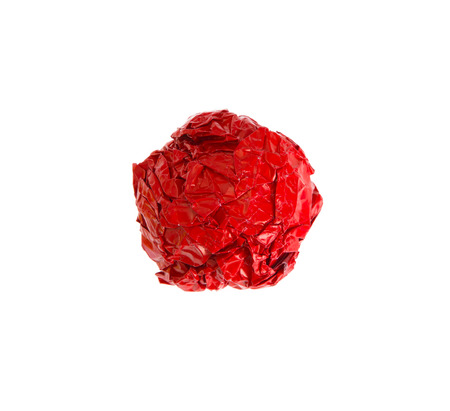 crumpled color paper ball isolated on white backgroundの写真素材