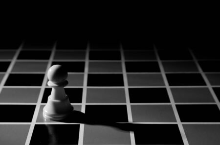 chess piece on the board backgroundの写真素材