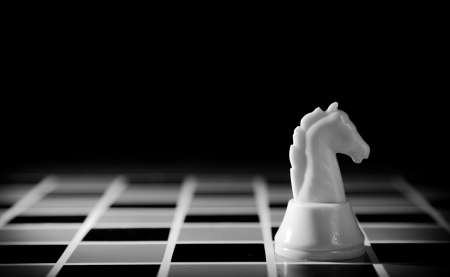 chess piece on the board backgroundの写真素材