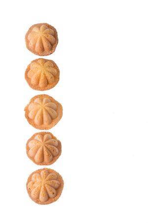 Kuih bahulu, Malay sweet egg sponge cake isolated on white backgroundの写真素材